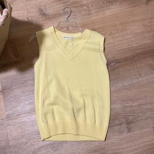 Yellow sweater vest